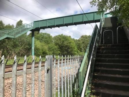 Railway footbridge to Danes Moss Nature Reserve