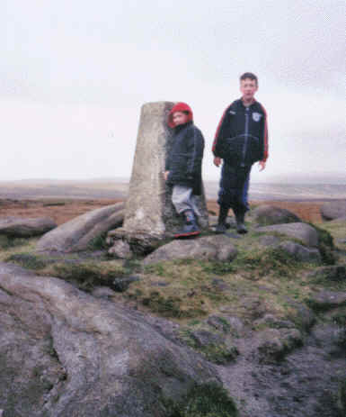 Jimmy & Liam reach the trig point on Boulsworth Hill