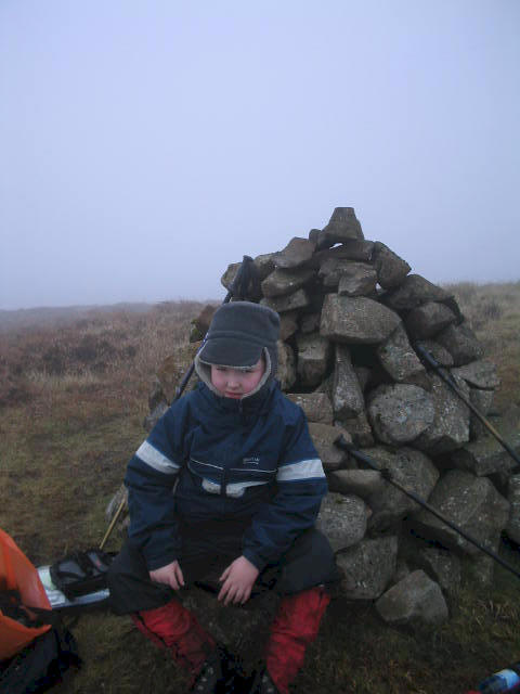 Liam at the summit cairn on Agnew's Hill