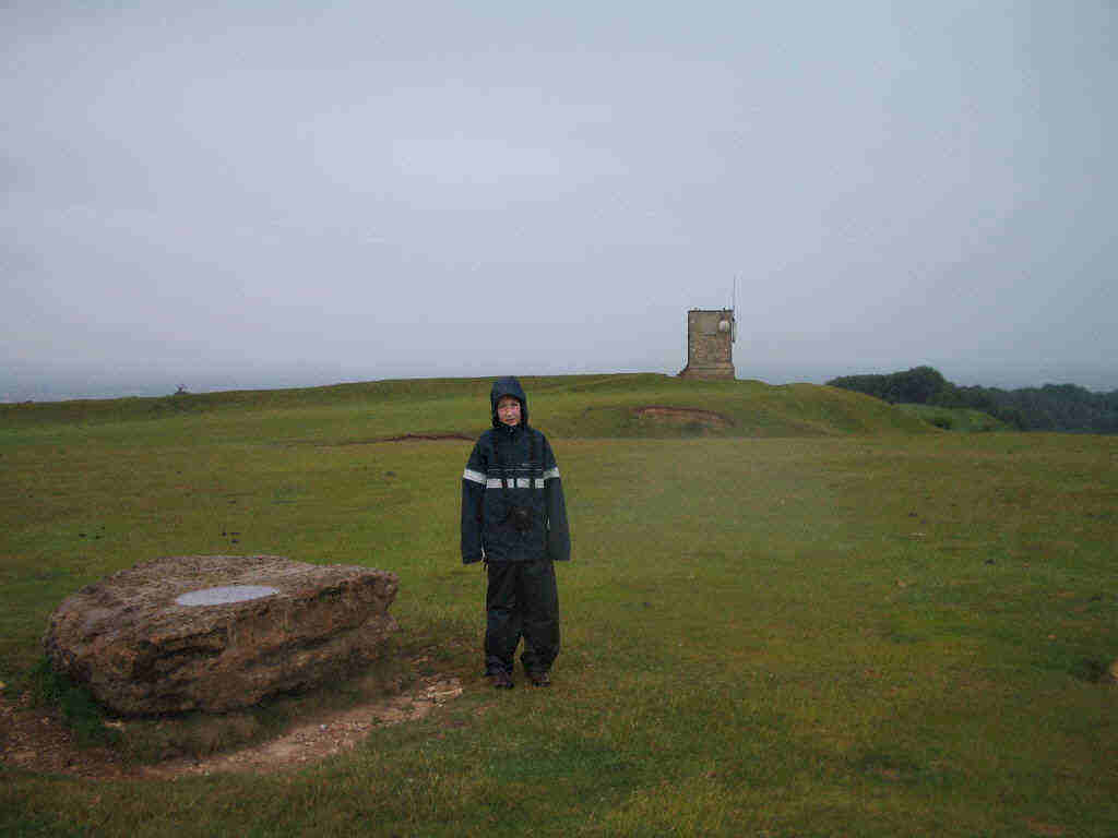 Jimmy at Banbury Stone, the summit marker on Bredon Hill CE-003