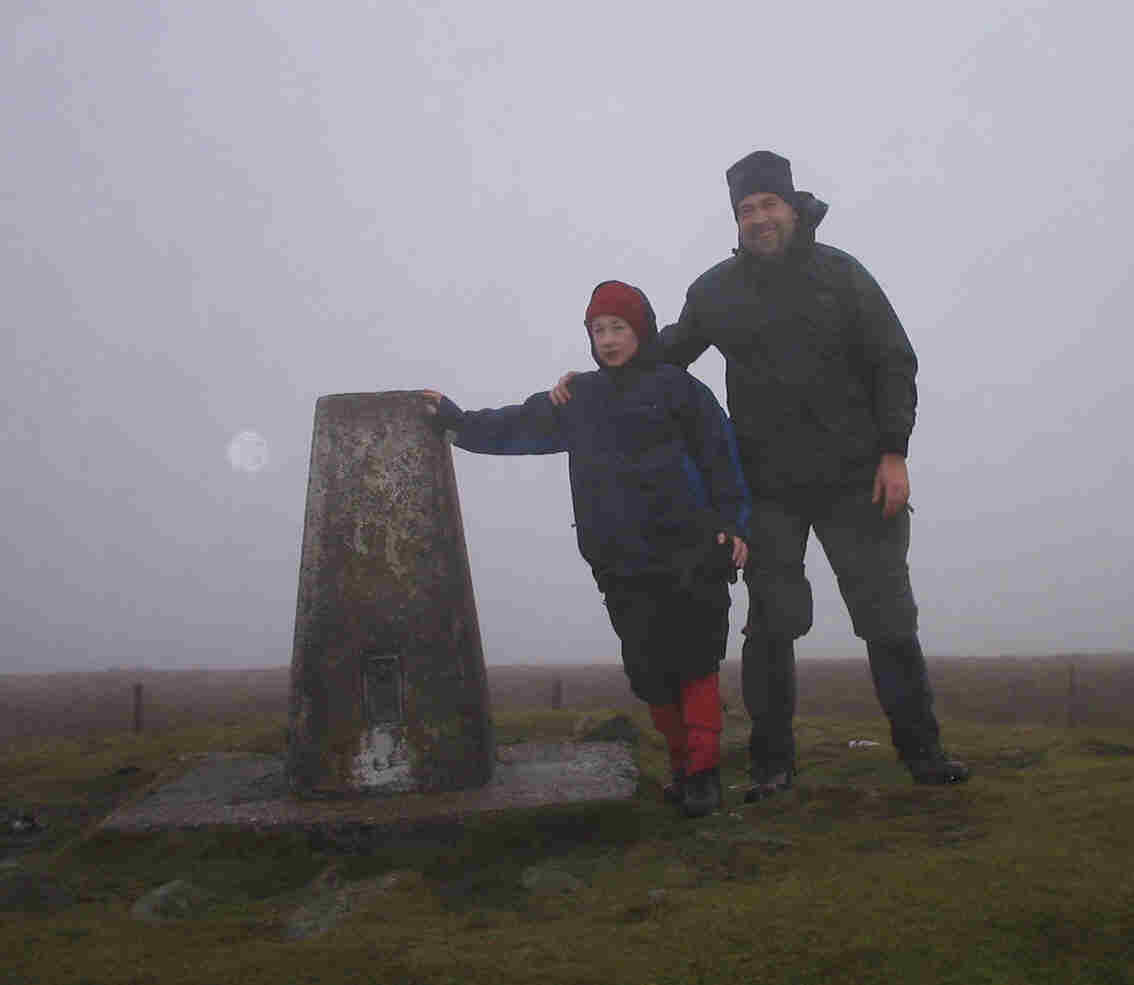 Jimmy & Tom at the Cadair Berwyn trig point, 827m