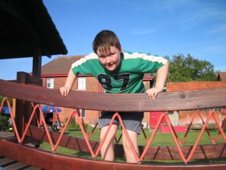 Liam playing on the campsite