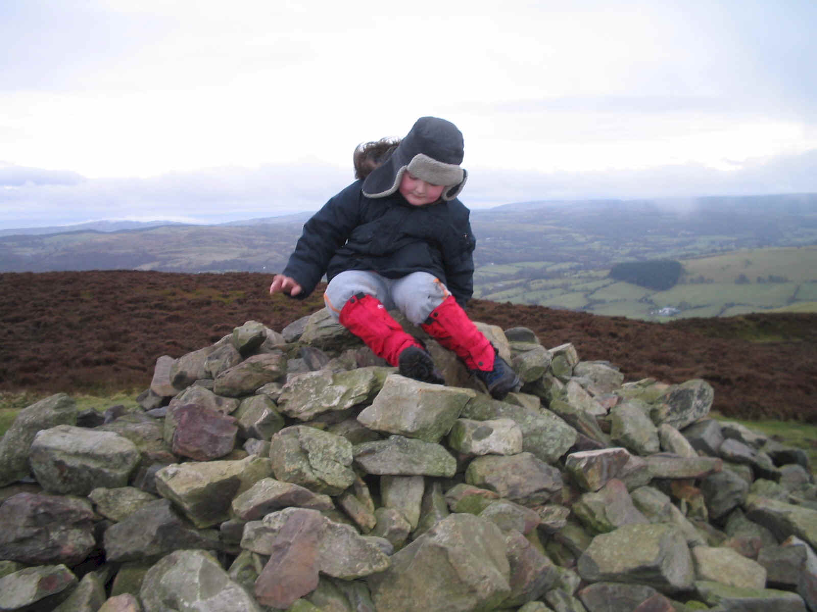 Liam takes his seat on the summit cairn of Foel Fenlli NW-051!