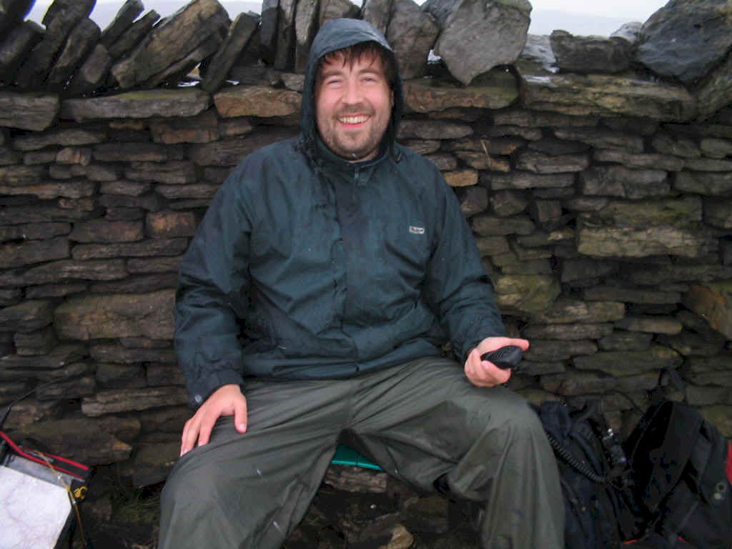 Tom M1EYP sheltering behind the wall on Freeholds Top