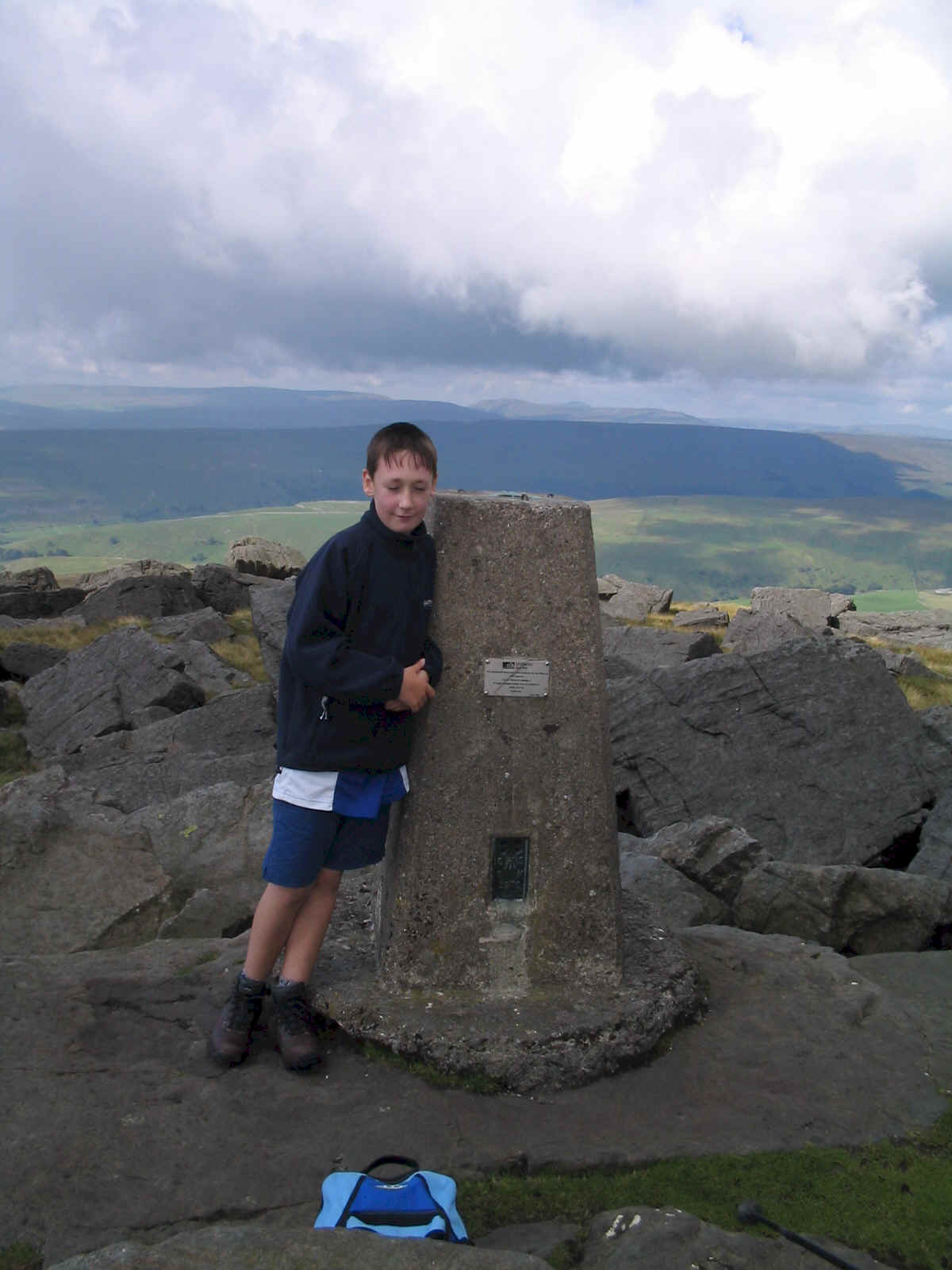 Jimmy at the trig point on Great Whernside