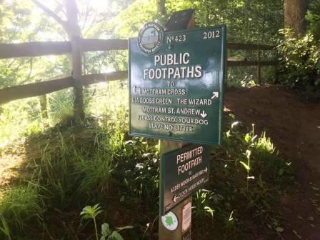 Footpath signs close to the boundary of Hare Hill estate