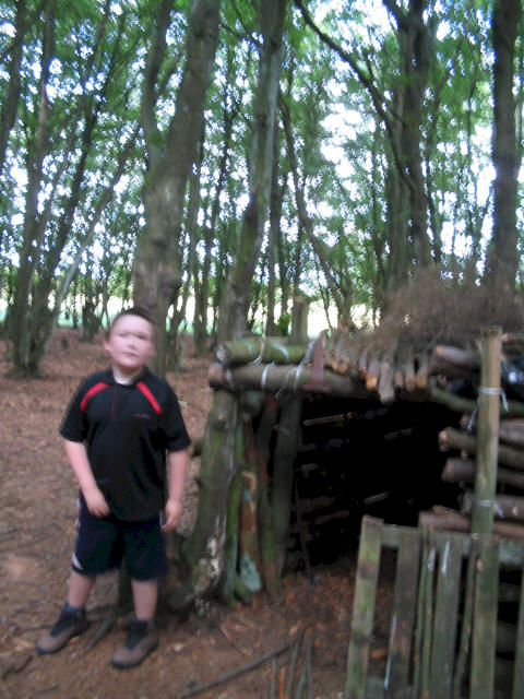 Liam inspects the den that Jimmy found!