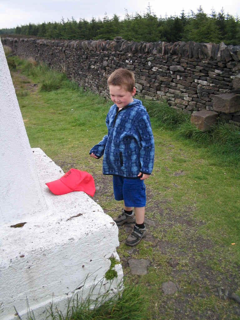 "Wherever I Lay My Hat" - Liam admires the trig point on Longridge Fell SP-014