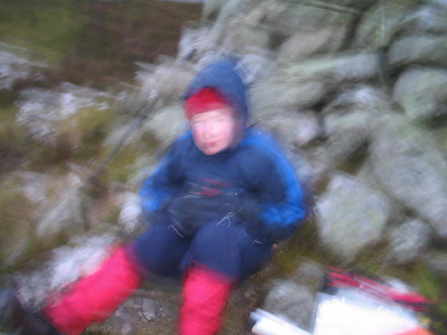 Jimmy by the summit cairn on Mynydd Nodol.  The conditions were unpleasant, so I only took one photo, and it didn't exactly come out.  Never mind...