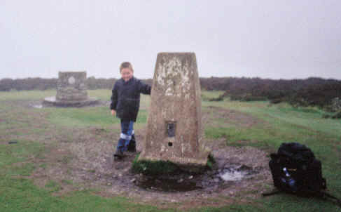 Liam at the summit of Pole Bank, on the Long Mynd