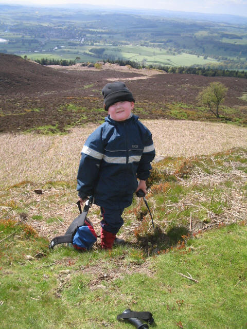 Liam retrieves the bag he had rolled down the steep hillside!