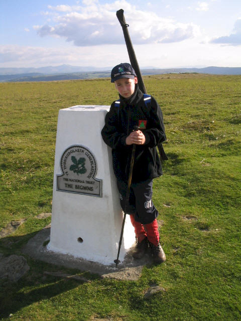 Jimmy by the titled trig point