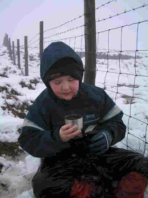 Liam enjoys some lentil & bacon soup