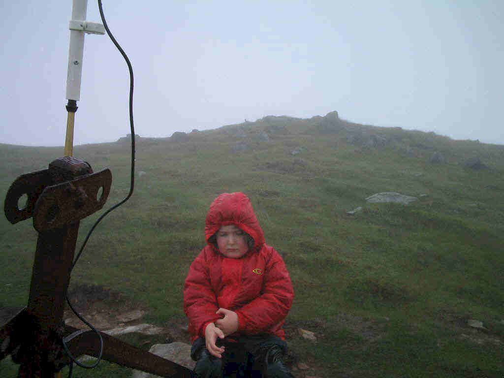 Liam clearly enjoying the downpour on Yr Aran!!!